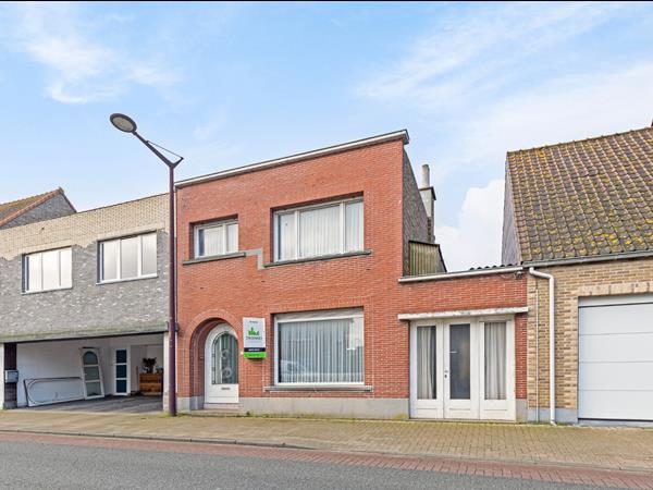 Statige en karaktervolle woning met zongerichte tuin en atelier