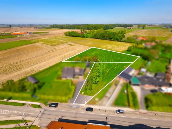 Landelijk gelegen lot bouwgrond voor open bebouwing met mogelijkheid tot extra weide / tuin