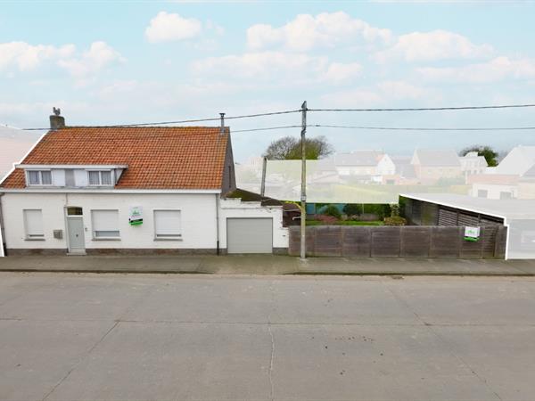 Halfopen woning met garage, tuin en 3 slpk